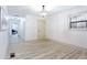 Bedroom and hallway with wood grain floors and overhead lighting at 2177 American Legion Rd, Dacula, GA 30019