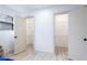 Double closets feature light colored wood-look floors and wire shelving at 2177 American Legion Rd, Dacula, GA 30019