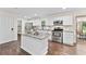 Modern kitchen with stainless steel appliances, granite countertops, and a center island for meal prep at 3263 Dodson Dr, Atlanta, GA 30344