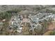 Panoramic aerial showing neighborhood with mature trees highlighting 11279 Serenbe Ln location at 11279 Serenbe Ln, Chattahoochee Hills, GA 30268