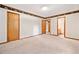 Spacious bedroom with neutral carpet, wood trim and view to hallway and bathroom at 1184 Alemeda Dr, Marietta, GA 30066