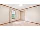 Bedroom with window, closet and neutral carpet and wood trim at 1184 Alemeda Dr, Marietta, GA 30066