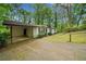 Charming single-story home with a covered carport and well-maintained lawn at 1184 Alemeda Dr, Marietta, GA 30066