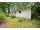 Exterior view of home with white siding and lush green surroundings at 1184 Alemeda Dr, Marietta, GA 30066