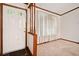 Bright foyer with slate tile flooring and decorative wood trim accents at 1184 Alemeda Dr, Marietta, GA 30066
