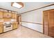Eat-in kitchen area featuring tile floors, wood trim, and access to nearby rooms at 1184 Alemeda Dr, Marietta, GA 30066