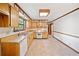 Well-lit kitchen featuring ample counter space, cabinets, and modern appliances at 1184 Alemeda Dr, Marietta, GA 30066