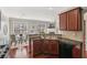 Modern kitchen with stainless steel appliances and a view to the dining area at 1921 Harrison Park Dr, Atlanta, GA 30341