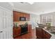 Modern kitchen with stainless steel appliances and a view to the dining area at 1921 Harrison Park Dr, Atlanta, GA 30341