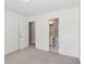 Empty room with white walls and a bathroom view at 1921 Harrison Park Dr, Atlanta, GA 30341