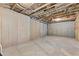 Unfinished basement space with concrete foundation offering potential for storage or future living area at 3286 Sweetleaf Ln, Buford, GA 30519