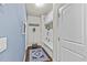 Inviting entryway with built-in storage, bench seating, and stylish decor creating an organized and welcoming space at 3286 Sweetleaf Ln, Buford, GA 30519