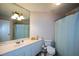 Bathroom with a long vanity and a bath tub at 1315 Mcgill Park Ne Ave, Atlanta, GA 30312