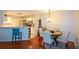 Charming dining area adjacent to the kitchen, featuring hardwood floors and stylish decor at 1315 Mcgill Park Ne Ave, Atlanta, GA 30312