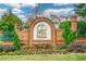The McGill Park brick entrance sign is surrounded by manicured landscaping and a wrought iron fence at 1315 Mcgill Park Ne Ave, Atlanta, GA 30312