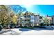 Multi-level condo building with balconies and landscaped grounds at 1315 Mcgill Park Ne Ave, Atlanta, GA 30312