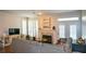 Inviting living room with a fireplace and access to a patio at 1315 Mcgill Park Ne Ave, Atlanta, GA 30312