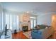 Comfortable living room with fireplace and hardwood floors at 1315 Mcgill Park Ne Ave, Atlanta, GA 30312