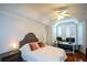 Inviting main bedroom boasting a tray ceiling, abundant natural light, and a cozy sitting area at 1315 Mcgill Park Ne Ave, Atlanta, GA 30312