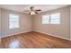 Bedroom with large windows providing plenty of natural light and hardwood floors at 244 Hurt Se Dr, Smyrna, GA 30082