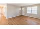 Spacious living room boasting gleaming hardwood floors and abundant natural light at 244 Hurt Se Dr, Smyrna, GA 30082
