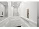Luxurious residential elevator with modern paneling and stainless steel accents at 255 Marjean Way, Alpharetta, GA 30009