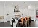 Gourmet kitchen features an island with waterfall countertops, pendant lights, and modern appliances at 255 Marjean Way, Alpharetta, GA 30009