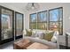 Inviting living room with multiple windows offering views of the outdoor landscape at 255 Marjean Way, Alpharetta, GA 30009