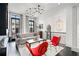 Bright living room featuring stylish furnishings and large windows providing ample natural light at 255 Marjean Way, Alpharetta, GA 30009