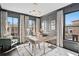 Elegant office space with dark gray walls, modern lighting, and large windows overlooking the neighborhood at 255 Marjean Way, Alpharetta, GA 30009