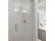 Modern shower features sleek glass door, tile surround, and updated fixtures, enhancing bathroom appeal at 255 Marjean Way, Alpharetta, GA 30009