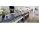 Open living space shows the kitchen and living area, with hardwood floors at 239 Sumac Trl, Woodstock, GA 30188