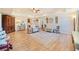Well-lit living room featuring hardwood floors, decorative furnishings, and an open layout at 239 Sumac Trl, Woodstock, GA 30188