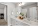 Modern bathroom vanity with double sinks, quartz countertop, and a large mirror at 4309 Elliott Way, Smyrna, GA 30082