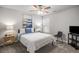 Bedroom with a painting on the wall, side table and a window with natural light at 4309 Elliott Way, Smyrna, GA 30082