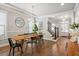Open dining room with hardwood floors, modern lighting and decor at 4309 Elliott Way, Smyrna, GA 30082