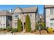 Beautiful brick home with manicured landscaping and mature trees at 4309 Elliott Way, Smyrna, GA 30082