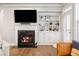 Elegant fireplace featuring built-in shelving and contemporary design at 4309 Elliott Way, Smyrna, GA 30082