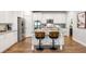 Modern kitchen with stainless steel appliances, white cabinets, and granite countertops at 4309 Elliott Way, Smyrna, GA 30082