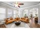 Open living area featuring hardwood floors, recessed lighting and plenty of natural light at 4309 Elliott Way, Smyrna, GA 30082