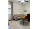 Inviting living room with neutral sofa, ceiling fan, and stylish decor at 60 Saddle Tree Way, Sugar Hill, GA 30518
