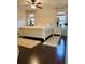 Inviting main bedroom with a classic white bed frame, matching nightstands, and wood flooring at 60 Saddle Tree Way, Sugar Hill, GA 30518