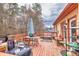 Spacious back deck with comfortable outdoor seating and BBQ, ideal for enjoying outdoor living and dining at 840 Cline Petty Way Way, Lawrenceville, GA 30043