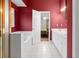 A spacious bathroom featuring a vanity with double sinks and a doorway leading to a bedroom at 840 Cline Petty Way Way, Lawrenceville, GA 30043