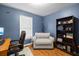 Comfortable office with hardwood floors, warm-colored walls, and bright window at 840 Cline Petty Way Way, Lawrenceville, GA 30043