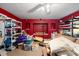 Storage room with red walls, shelving and recessed shelving offering ample space for organized storage at 840 Cline Petty Way Way, Lawrenceville, GA 30043