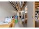 Long unfinished basement with exposed duct work and unfinished walls for customizable storage solutions at 840 Cline Petty Way Way, Lawrenceville, GA 30043