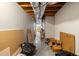 Unfinished basement with concrete floors and exposed ductwork, offering potential for customizable storage or living space at 840 Cline Petty Way Way, Lawrenceville, GA 30043