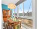 Cozy dining area filled with natural light, complemented by a decorative light fixture at 130 26Th Nw St # 615, Atlanta, GA 30309