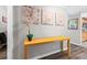 Contemporary hall table styled with modern art and floral arrangements, great flooring at 130 26Th Nw St # 615, Atlanta, GA 30309